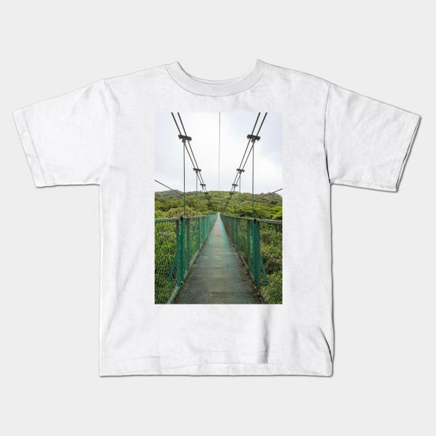 Suspension bridge in rainforest Kids T-Shirt by Juhku